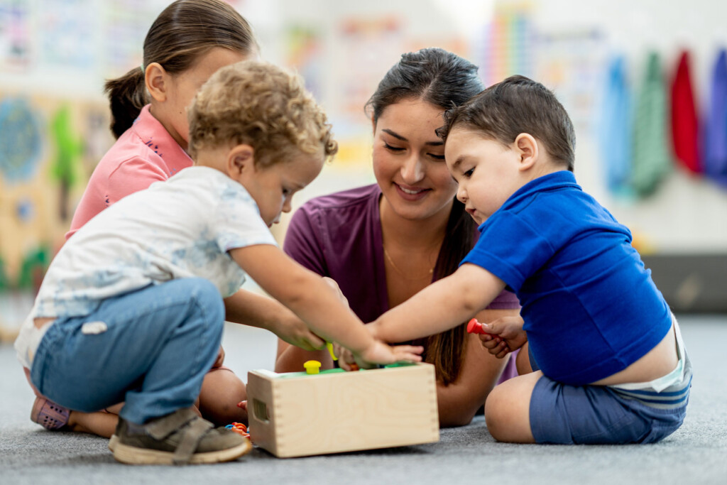 Children with teacher, learning, at Montessori School, Eagan Montessori Academy open house